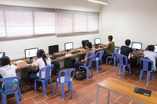 Students are practicing computers in a classroom. Photo: Leang Phanara 